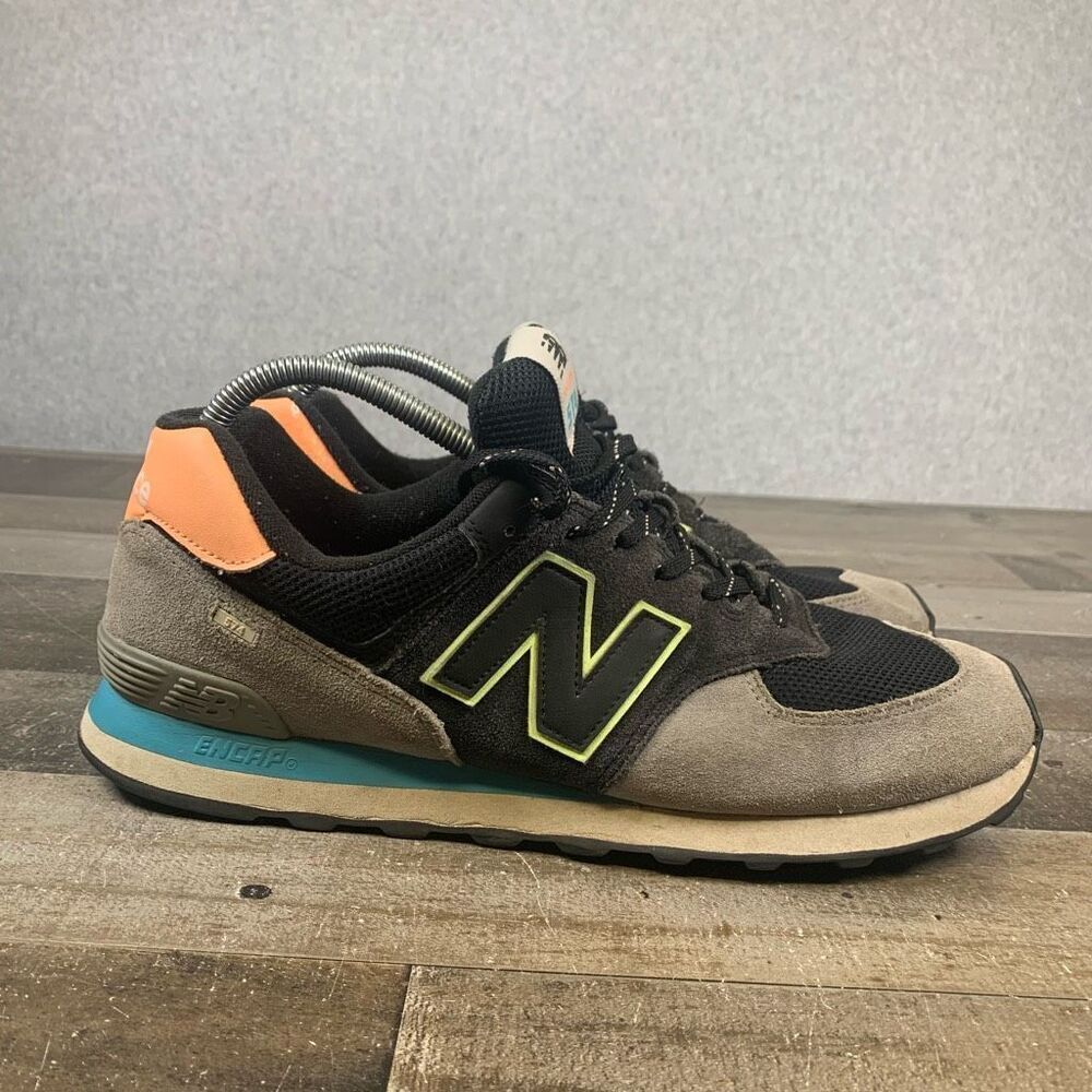 New Balance Black and Gray Sneakers with Orange and Green Accents